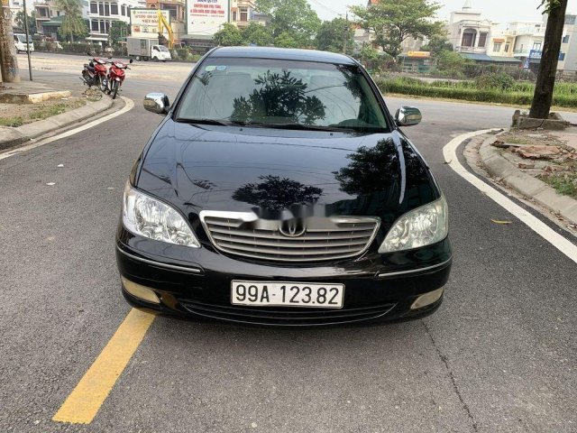 Cần bán gấp Toyota Camry đời 2003, màu đen số sàn, 258tr0