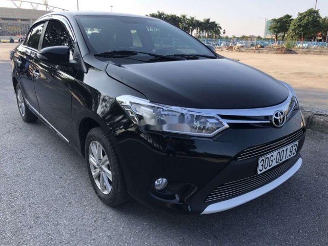 Cần bán gấp Toyota Vios sản xuất 2014, màu đen chính chủ0