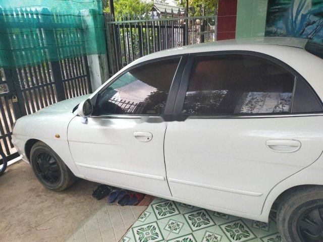 Cần bán xe Daewoo Nubira đời 2002, màu trắng, xe nhập chính chủ