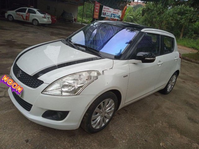 Cần bán gấp Suzuki Swift 1.4 AT năm sản xuất 2015, màu trắng, nhập khẩu nguyên chiếc0