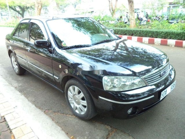 Cần bán xe Ford Laser 1.8AT 2004, màu đen như mới giá tốt