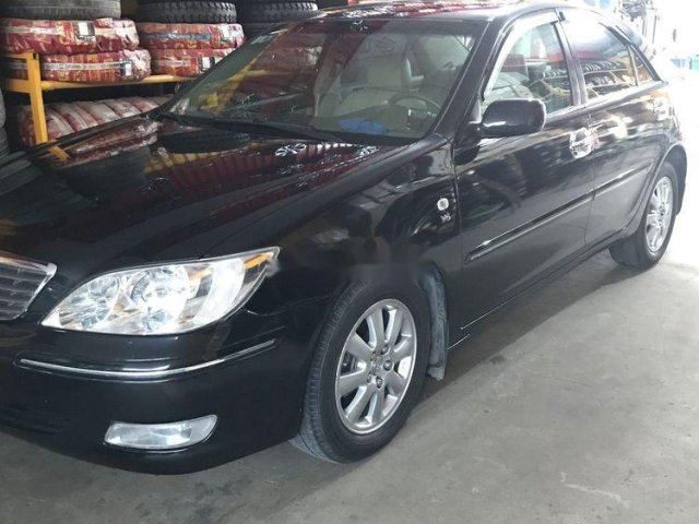 Bán Toyota Camry đời 2003, màu đen số tự động0