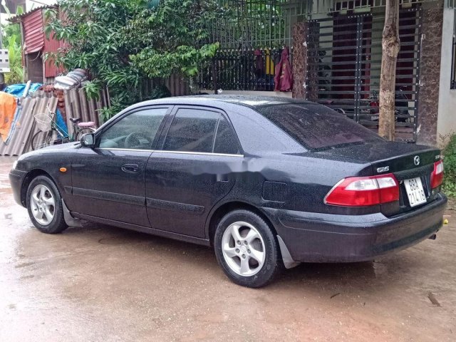 Cần bán lại xe Mazda 626 sản xuất 2003, màu đen chính chủ, giá tốt