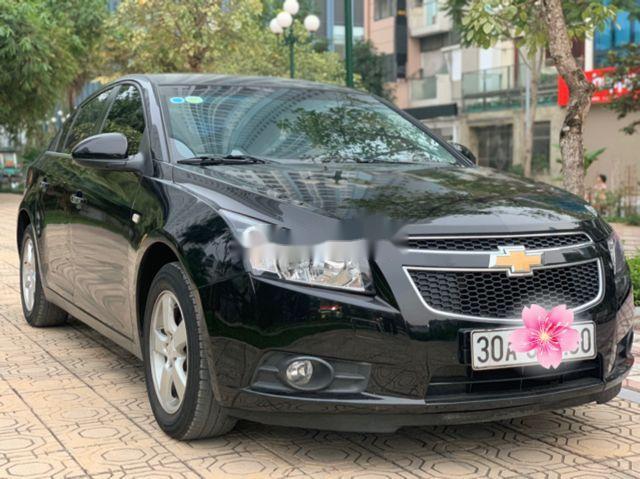 Bán Chevrolet Cruze LS 1.6MT đời 2014, màu đen chính chủ0