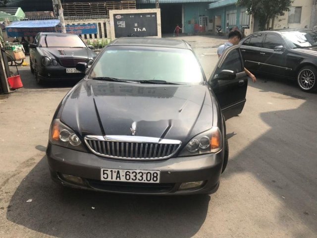 Bán ô tô Daewoo Magnus sản xuất 2004, màu đen, xe nhập