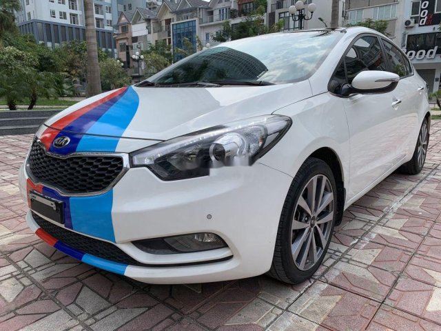 Cần bán Kia K3 2.0AT đời 2014, màu trắng, 518tr0