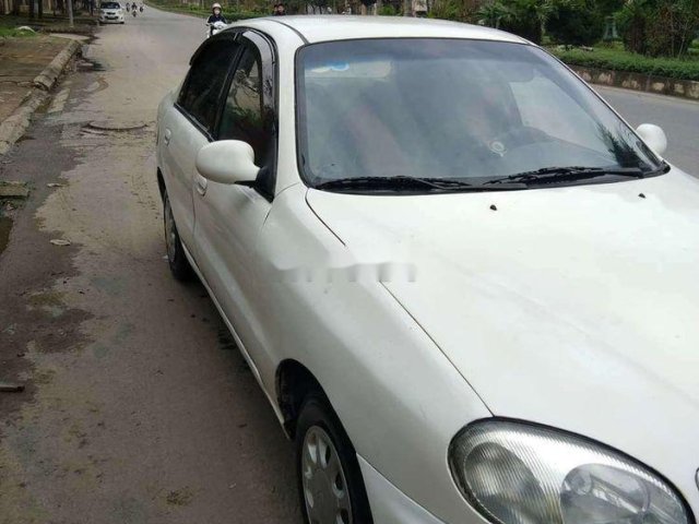 Cần bán xe Daewoo Lanos năm 2002, màu trắng0