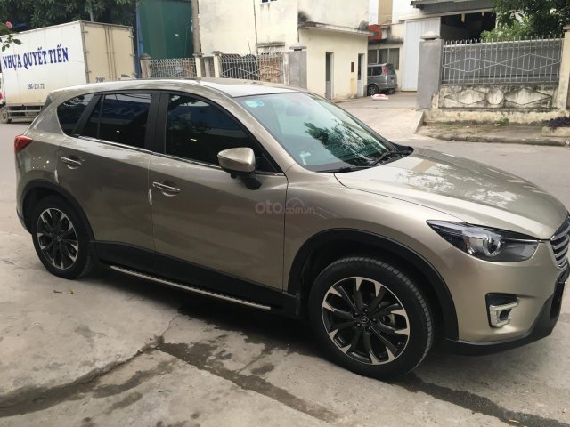 Bán xe Mazda CX 5 2.5 AT AWD (2 cầu) 2016, màu vàng cát