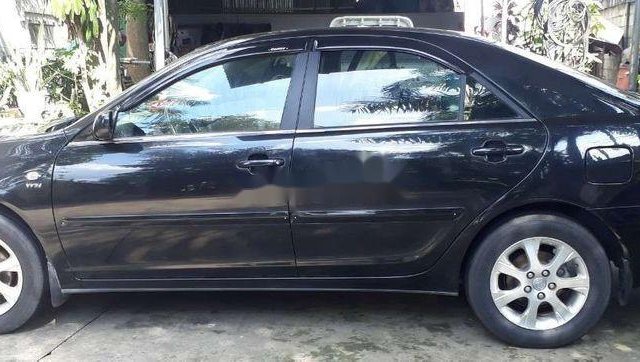 Bán ô tô Toyota Camry sản xuất 2005, màu đen xe gia đình, 375tr xe nguyên bản