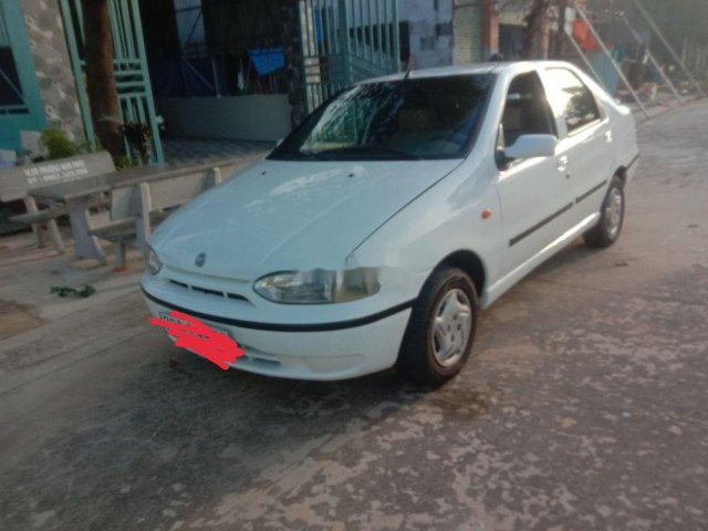 Cần bán xe Fiat Siena sản xuất 2003, màu trắng chính chủ, giá tốt xe nguyên bản0