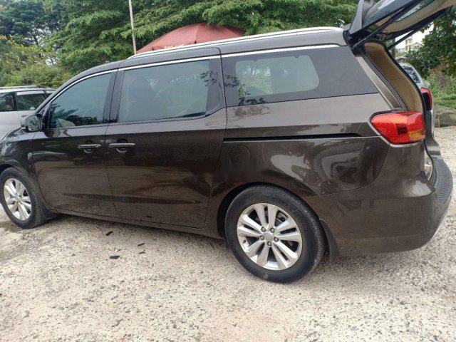 Bán Kia Sedona sản xuất 2015, màu nâu xe nguyên bản0