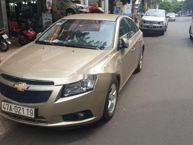 Cần bán Chevrolet Cruze đời 2012, màu vàng, chính chủ, 305 triệu0