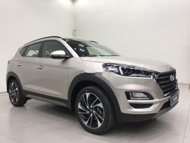 Bán xe Hyundai Tucson đời 2019, màu vàng kem, mới hoàn toàn0