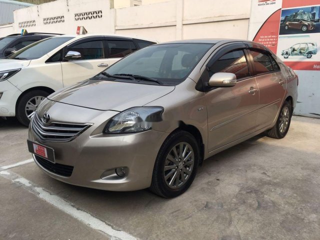 Cần bán gấp Toyota Vios G sản xuất 2014, màu vàng số tự động0