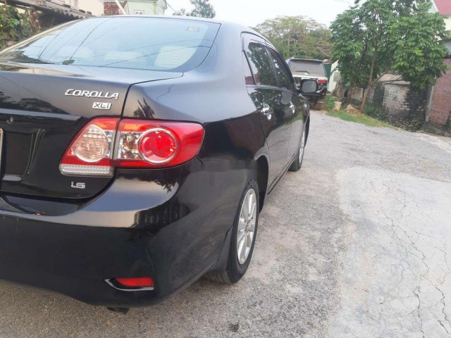 Bán Toyota Corolla Altis XLi sản xuất năm 2010, màu đen, xe nhập, giá tốt