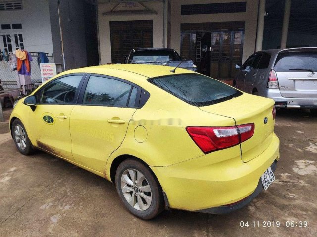 Cần bán xe Kia Rio năm sản xuất 2015, màu vàng, xe nhập0