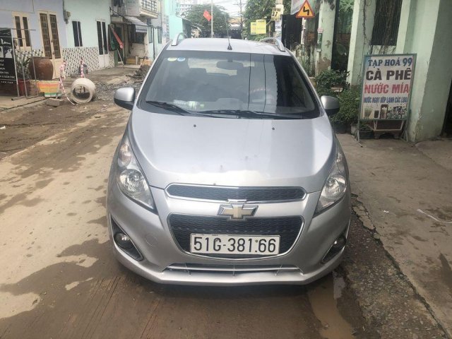 Bán Chevrolet Spark đời 2014, màu bạc xe gia đình0