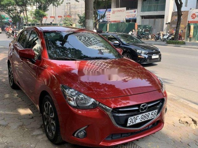 Cần bán xe Mazda 2 sản xuất 2016, màu đỏ xe gia đình xe nguyên bản0