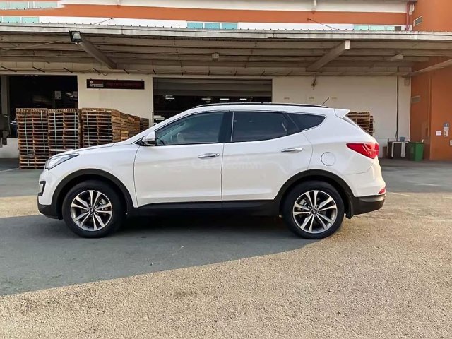 Bán ô tô Hyundai Santa Fe 2016, màu trắng xe cfon mới lắm0