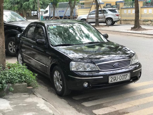 Bán xe Ford Laser năm sản xuất 2004, màu đen, giá rẻ