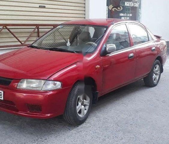 Cần bán Mazda 323 đời 2000, màu đỏ, nhập khẩu  0