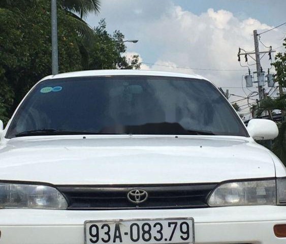 Cần bán Toyota Corolla sản xuất năm 1995, màu trắng0