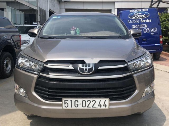 Cần bán lại xe Toyota Innova 2.0E đời 2018 như mới