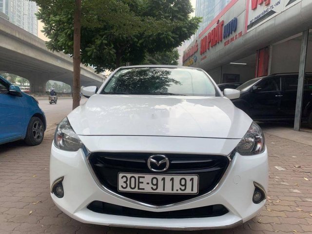 Bán Mazda 2 sản xuất năm 2015, màu trắng, chính chủ