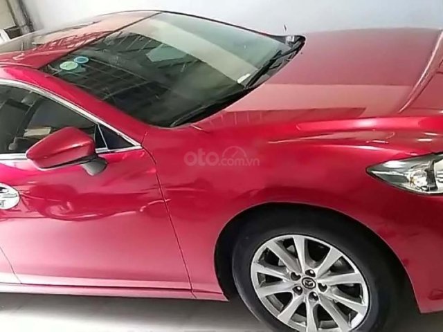 Cần bán xe Mazda 6 2016, màu đỏ xe còn mới0