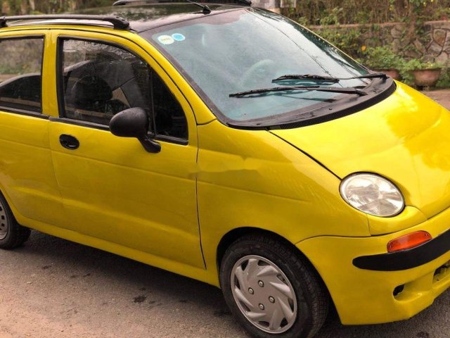 Bán Daewoo Matiz sản xuất năm 2002, màu vàng, xe gia đình0