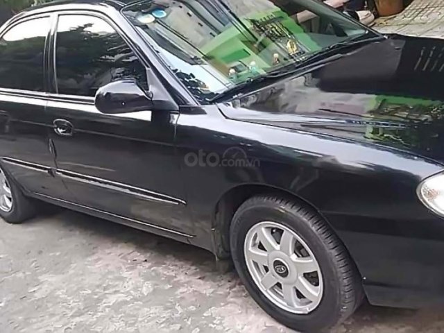 Bán xe Kia Spectra đời 2003, màu đen, nhập khẩu nguyên chiếc, giá 160tr0