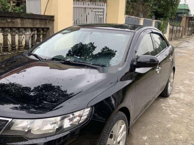 Cần bán gấp Kia Forte năm sản xuất 2011, màu đen còn mới0