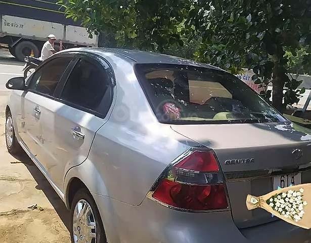 Cần bán lại xe Daewoo Gentra đời 2009, màu bạc0