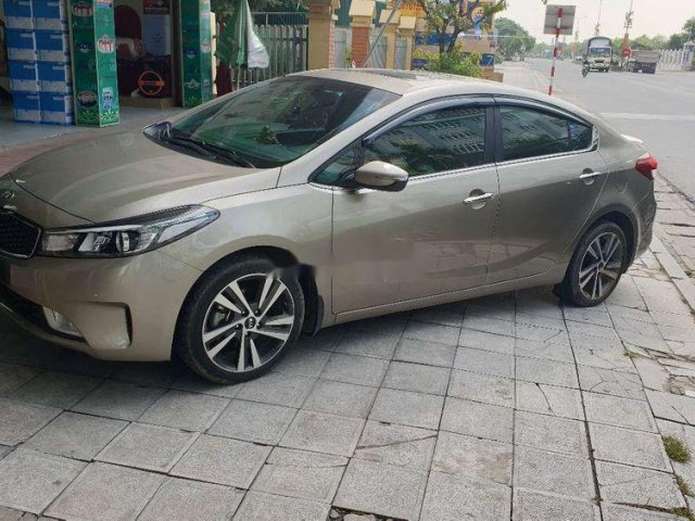 Cần bán gấp Kia Cerato đời 2018, màu vàng, nhập khẩu còn mới0