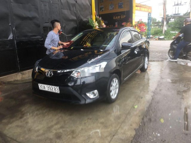 Cần bán lại xe Toyota Vios sản xuất 2014, màu đen  0