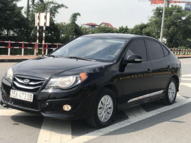 Cần bán Hyundai Avante đời 2014, màu đen còn mới, 335tr