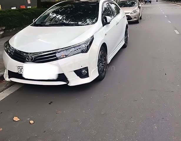 Cần bán lại xe Toyota Corolla Altis đời 2015, màu trắng xe nguyên bản0