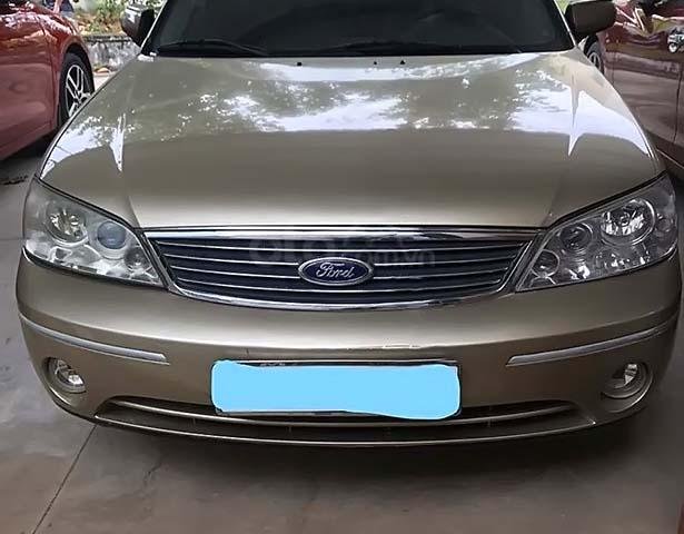 Cần bán xe Ford Laser năm 2003, màu vàng số tự động