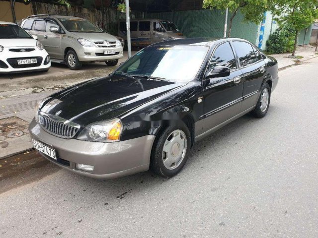 Chính chủ bán Daewoo Magnus đời 2004, màu đen, 135 triệu