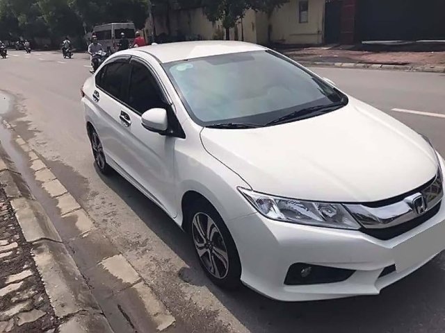 Bán Honda City năm 2015, màu trắng số tự động xe nguyên bản0