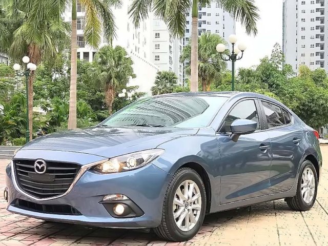 Cần bán Mazda 3 1.5 AT đời 2015, màu xanh lam, giá 559tr0