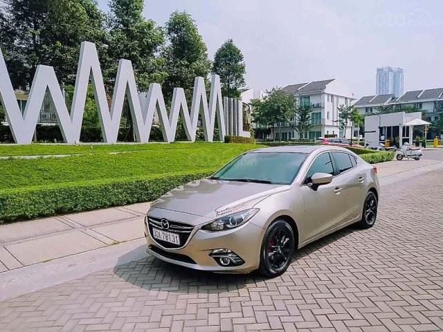 Xe Mazda 3 năm sản xuất 2015, màu vàng0