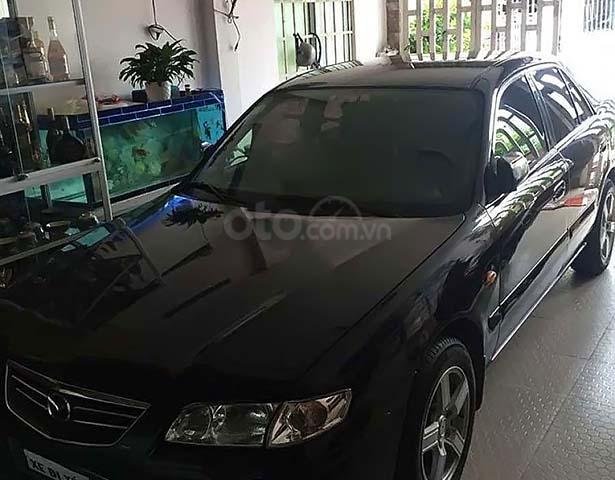 Bán xe cũ Mazda 626 2.0 MT năm 2003, màu đen0