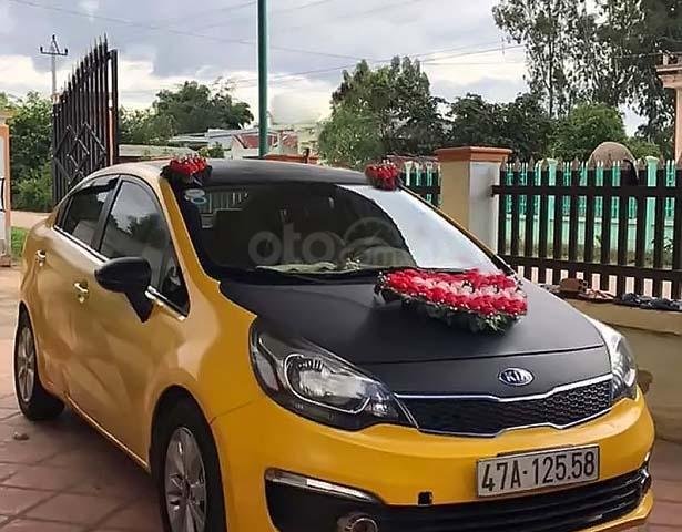 Bán Kia Rio 1.4 MT đời 2015, màu vàng, xe nhập 