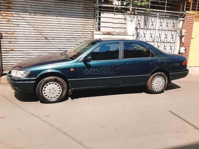 Bán Toyota Camry sản xuất 1998, màu xanh, xe chính chủ0