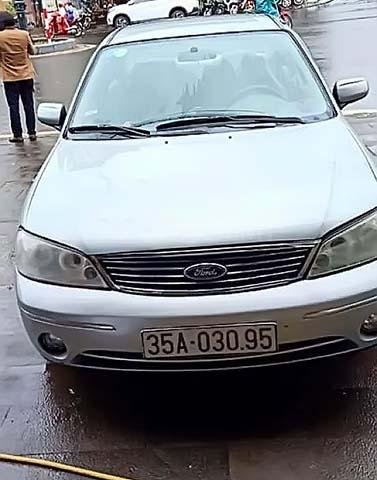 Bán xe Ford Laser GHIA 1.8 MT sản xuất 2003, màu bạc, số sàn