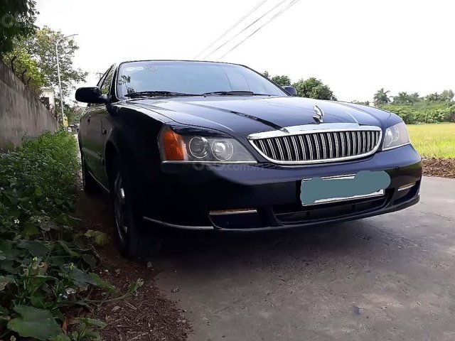 Bán Daewoo Magnus 2.5 AT đời 2004, màu đen, giá chỉ 110 triệu