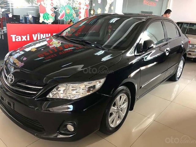 Cần bán Toyota Corolla Altis 1.8G năm 2014, màu đen, số tự động, 565tr