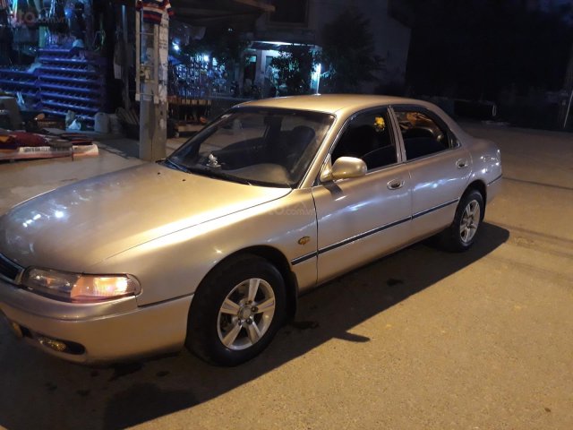 Cần bán xe Mazda 626 1997, màu vàng, nhập khẩu nguyên chiếc0