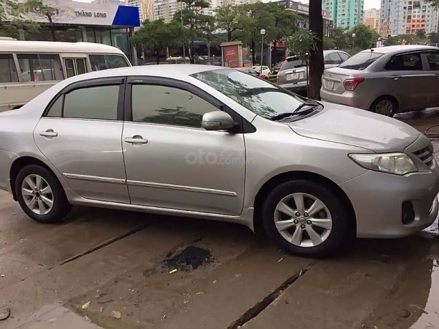 Cần bán xe Toyota Corolla Altis 1.8G MT đời 2012, màu bạc chính chủ, 445tr